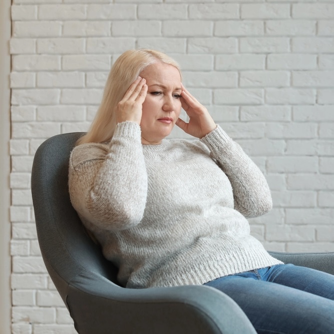 woman with a headache possibly due to abusing tramadol