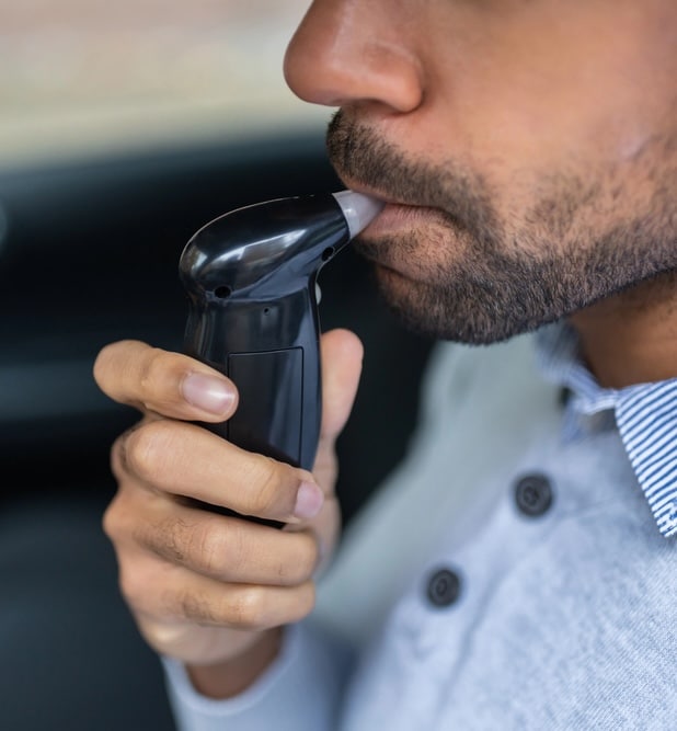 How Long Does Alcohol Stay in Your System image of breathalyzer